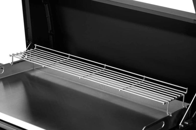 Metal grill rack on a black grill